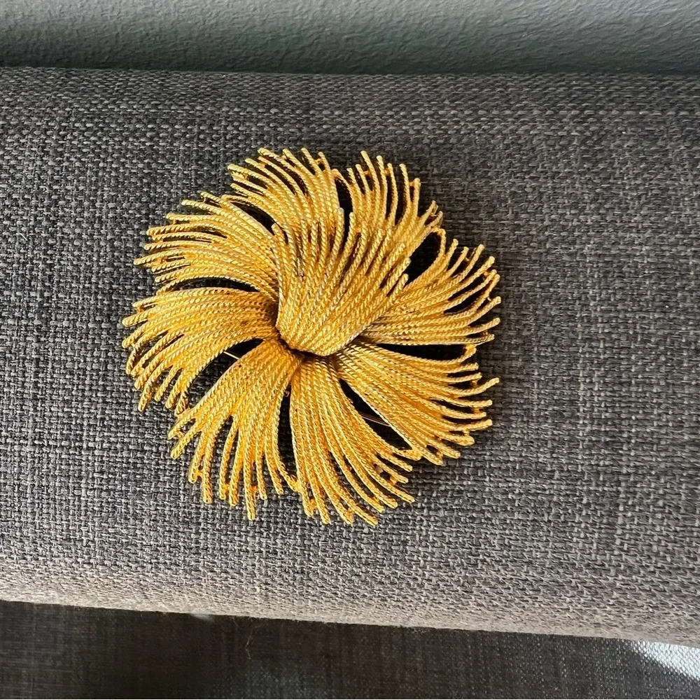 Vintage Monet pin from 1960’s with some patina on the metal - lovely for…